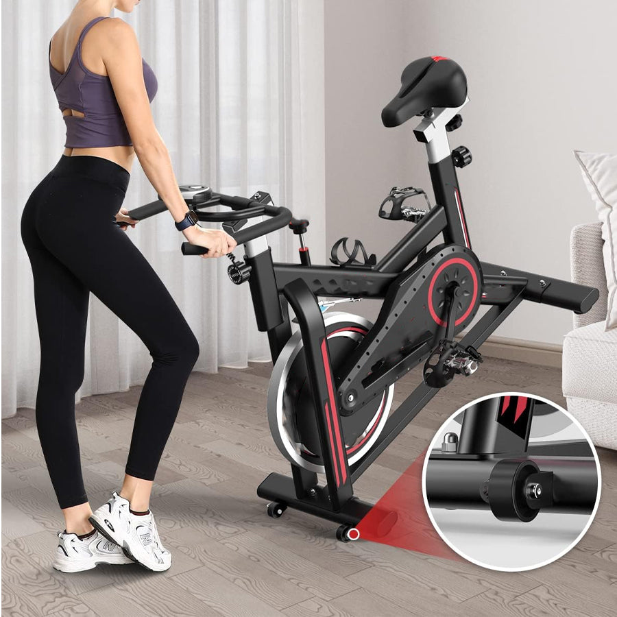 Ultra-Quiet Cardio Exercise Bike with LCD Display - Stationary Spin Bike for Home Fitness - Adjustable Resistance Levels - Built-in Tablet Holder - Belt-Driven System - Comfort Padded Seat -